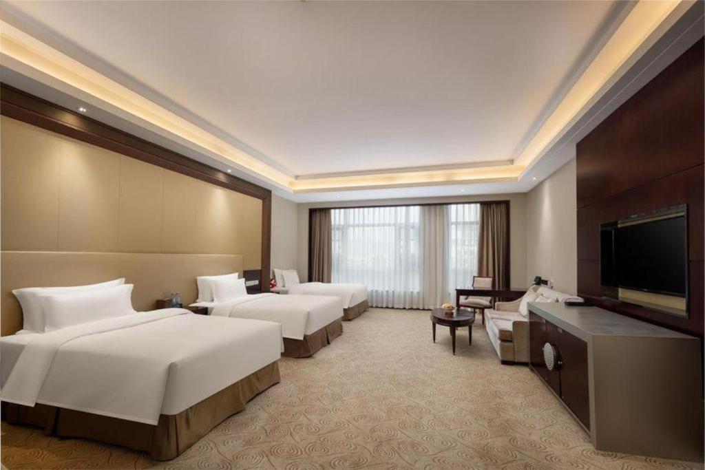 Linyi Blue Horizon International Hotel Yi He Exterior foto