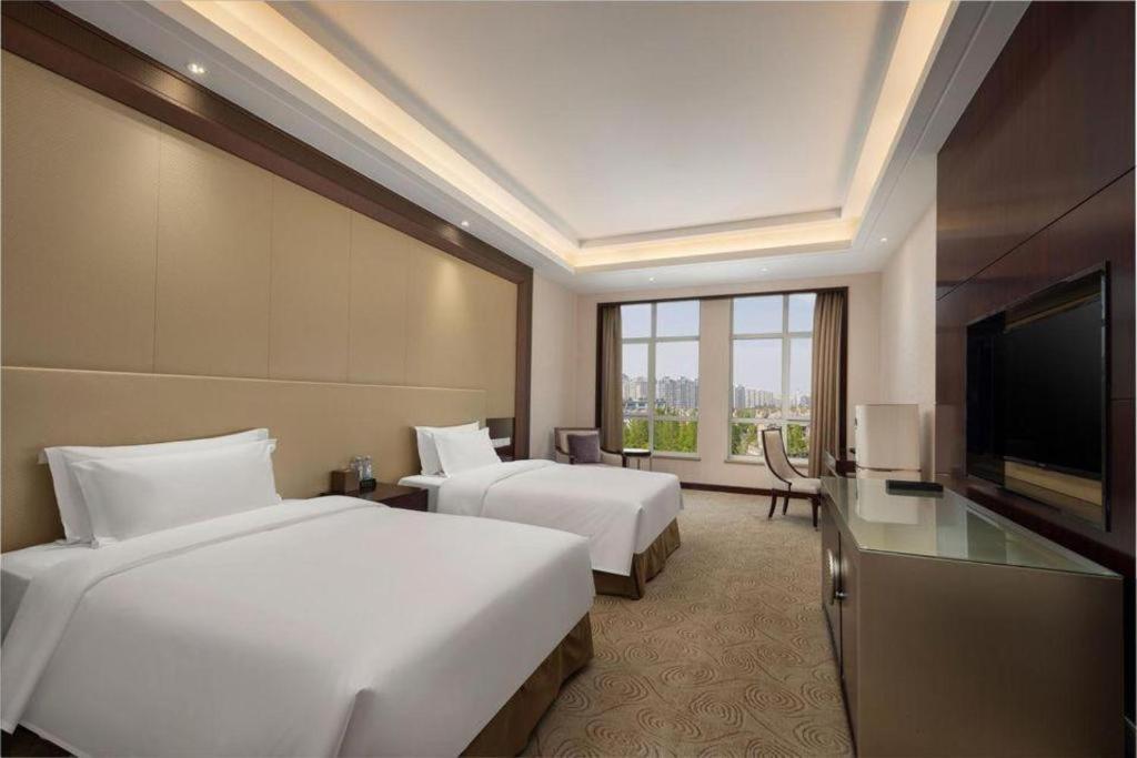 Linyi Blue Horizon International Hotel Yi He Exterior foto